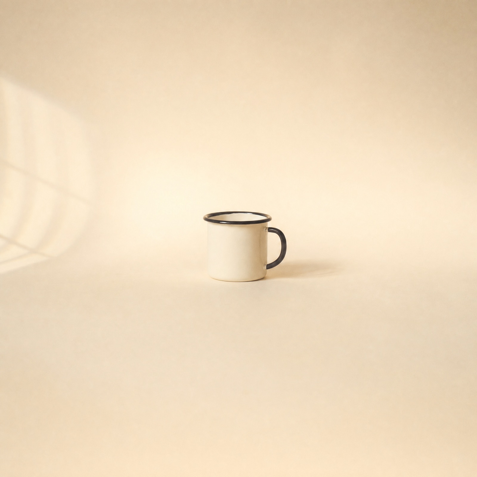 No. 03 Enamel Mug Set — bone-white steel enamelware with ink-black rims